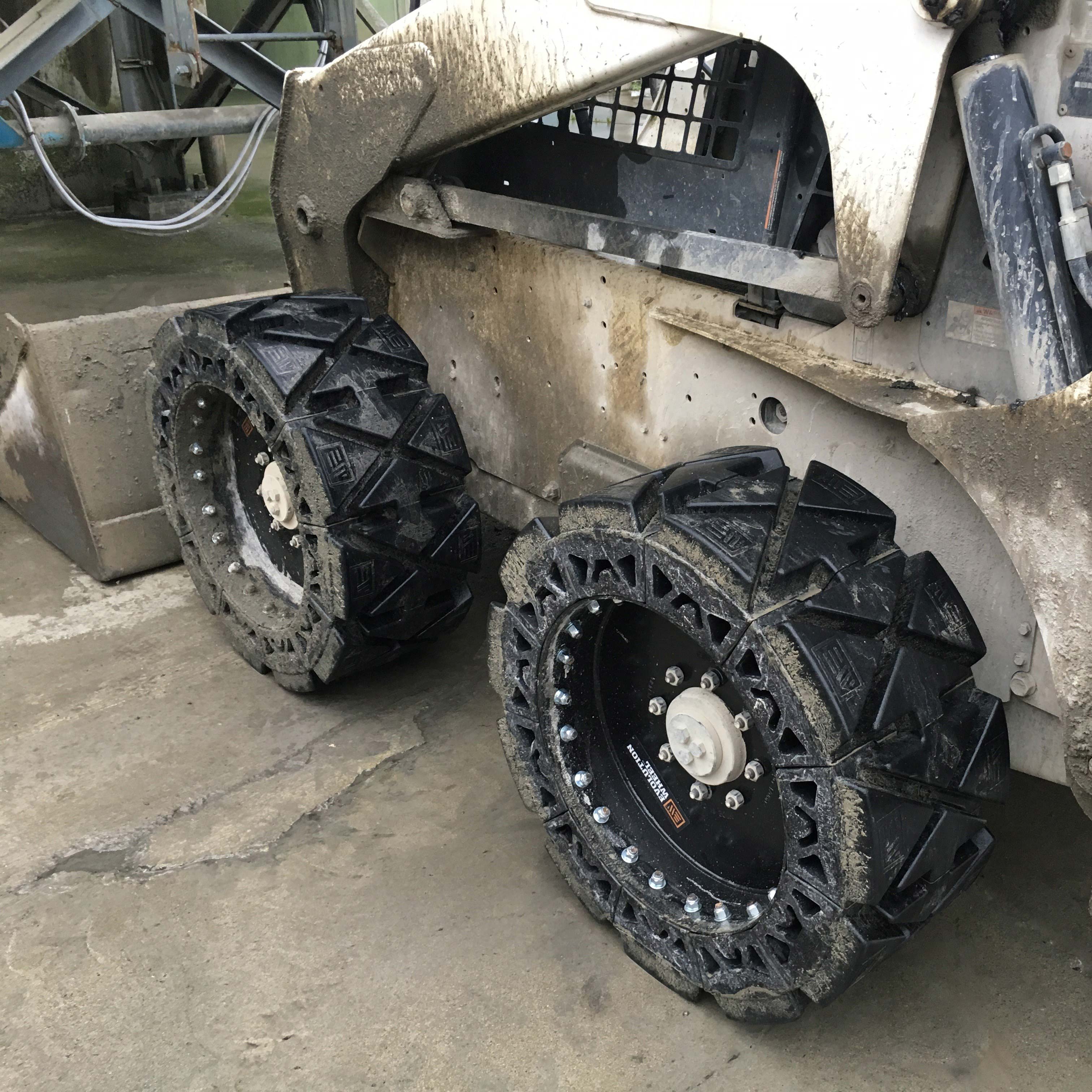 Solid Tires for Skid Steer - Evolution Wheel - No More Flat Tires